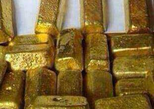 gold bar and gold nuggets